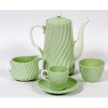 MINTON PORCELAIN DEMITASSE SET, ELEVEN PIECES:  The Minton demitasse set is pale green in color,