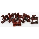 CHINESE TEAKWOOD HORSES, SEVEN, H 3"-5": Each  carved in a different pose, integral bases.