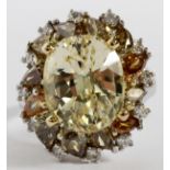 9.68CT NATURAL YELLOW SAPPHIRE & DIAMOND RING,  GIA, SIZE 7: A 18kt white gold lady's ring,