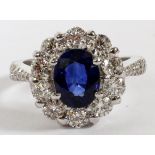 1.97CT NATURAL SAPPHIRE & DIAMOND LADY'S CLUSTER  RING, SIZE 5.75, GIA: An 18kt white gold lady's