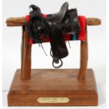 F. MCCREA, MODERN MIXED MEDIA SCULPTURE, H 9", L  10 1/2", D 6", 'CHEYENNE SADDLE-1875':