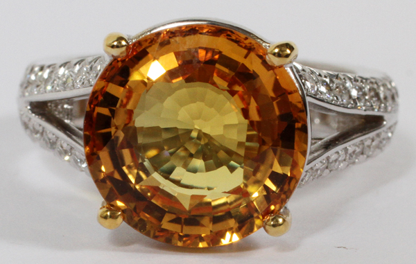 7.45CT NATURAL ORANGE YELLOW SAPPHIRE & DIAMOND  RING, SIZE 7, GIA: An 18kt white gold lady's  ring,