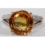 7.45CT NATURAL ORANGE YELLOW SAPPHIRE & DIAMOND  RING, SIZE 7, GIA: An 18kt white gold lady's  ring,