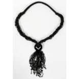 ATTRIBUTED TO GERDA LYNGGAARD FOR MONIES BEADED  NECKLACE, L 24" OVERALL: A multi-strand black  bead