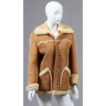 LADY'S SHEARLING THREE-QUARTER LENGTH COAT, L  31": Fitted with five front bottoms and open  pockets