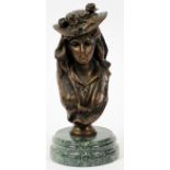 BRONZE BUST OF A YOUNG GIRL, H 10" W 3 3/4":  Mounted to a green marble plinth, depicting the