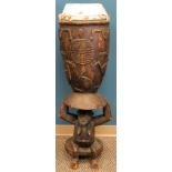 AFRICAN SENUFO CARVED WOOD DRUM, H 45": Having a seated figure at the base, decorated in bas