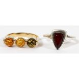 AMBER & STERLING RINGS, TWO, SIZES 7.5 & 8: Including one sterling silver lady's ring, featuring a