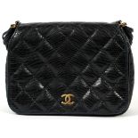 CHANEL QUILTED NAVY CAVIAR LEATHER HANDBAG, W 8": Single flap clips open to a one zippered pocket
