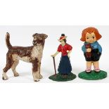 CAST IRON FIGURAL DOORSTOPS, THREE, H 8" - 9", W 8": Including 1 woman standing with a croquet