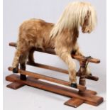 CHILD'S FULL HAIR GLIDER HORSE, H 43" L 52": Full hair covered body, with painted mouth, mounted