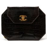 CHANEL BROWN CROCODILE SHOULDER BAG, W 7 1/2": Twist clip opens to a brown leather lined interior,