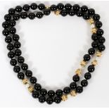 ONYX, PEARL & GOLD BEAD NECKLACE, L 30": Individually knotted onyx beads also strung with six pearls