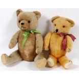 HERMANN TEDDY BEARS, 2 PCS., H 19" - 23": One Hermann teddy bear, H 23", and one other English