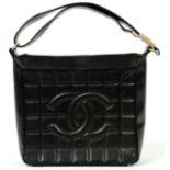 CHANEL BLACK LEATHER SHOULDER BAG, W 8": Zippered pocket opens to a cloth lined interior, fitted