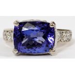 4.00CT NATURAL TANZANITE & DIAMOND RING, SIZE 5: A 14kt white gold lady's ring, featuring a 4.00