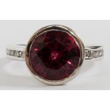 4.66CT NATURAL RASPBERRY GARNET & DIAMOND RING, SIZE 6: A 14kt white gold lady's ring, featuring a