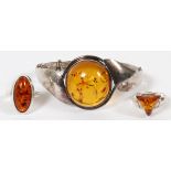 SILVER & AMBER BRACELET AND RINGS, THREE PIECES: Including 1 hinged bracelet and 2 rings; each piece