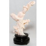 CHINESE WHITE CORAL FIGURE OF A BEAUTY, H 5": Carved as a standing female figure holding an