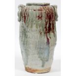 CHINESE STUDIO POTTERY VASE, H 11" W 6": Decorated in a celadon and red glaze, with applied handle