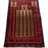 BOKHARA HAND WOVEN WOOL PRAYER RUG, W 2' 5" L 3' 10": Having a tan ground, with red and navy
