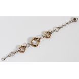 14KT GOLD & 1.00CT DIAMOND BRACELET, L 8": A 14kt tri-color gold lady's bracelet, featuring three