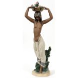 LLADRO GRES FIGURE OF A WOMAN, 'NATIVE,', H 30 1/2", #13502: Semi-nude carrying basket of fruit on