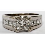 14KT WHITE GOLD & 1.30CT PRINCESS CUT DIAMOND RING: An unmarked 14kt white gold mount centered by