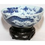 CHINESE BLUE & WHITE PORCELAIN DRAGON BOWL, H 4 1/2", DIA 11 1/2": Decorated with two dragons at the