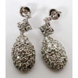 6.50CT DIAMOND LADY'S DANGLE EARRINGS, PAIR, L 1 1/4": A pair of 14kt white gold lady's dangle