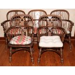 WALNUT WINDSOR ARMCHAIRS, FIVE: Each has a pierced splat and spindles, turned supports joined by