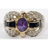 18KT WHITE GOLD, AMETHYST, & DIAMOND RING: Marked, "750". Oval amethyst, with 6 deep blue princess