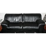 NATUZZI, ITALIAN BLACK LEATHER SOFA, MODERN, H 32", L 84, D 39": A two seat sofa, upholstered in