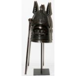 AFRICAN TRIBAL CARVED WOOD HELMET MASK, 20TH C., H 16", W 8": A helmet mask, adorned with
