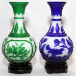 CHINESE PEKING GLASS VASES, TWO, H 9 3/4": Including 1 white glass vase with green overlay, carved