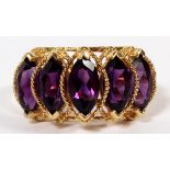 14KT YELLOW GOLD & AMETHYST RING: With 5 oval shape amethyst. Size 8.25. Total weight 3.4gr.