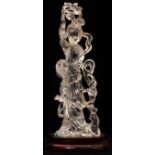 CHINESE ROCK CRYSTAL QUARTZ FIGURE, H 11", W 4": Carved as a female figure holding a basket. Mounted