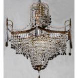 BRASS AND CRYSTAL NINE-LIGHT CHANDELIER, H 26", DIA 24": Having crystal beads and prisms. Later 20th