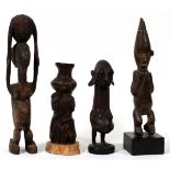 AFRICAN WOOD CARVED SCULPTURES, FOUR: two measure 12" H., one 8 1/4" H. and fourth, 8 1/2" H.