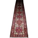 HERIZ PERSIAN RUNNER, 12' 10" X 2' 7": Central ivory ground with multiple medallions. All wool, hand