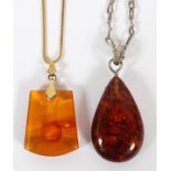AMBER PENDANTS [2], L 1 1/2", WITH 14KT GOLD & STERLING NECKLACES: Including 1 amber pendant with an