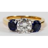 1.11CT DIAMOND & SAPPHIRE LADY'S RING, GIA, SIZE 6.25: A 14kt yellow gold lady's ring, featuring a