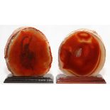 POLISHED AGATE SLICES, TWO, H 4 1/2", W 4 1/4": Each is mounted on a wood base.