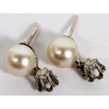 CULTURED PEARL AND DIAMOND DANGLE EARRINGS, PAIR: Approximately .25 ct diamond.