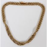 14KT YELLOW & WHITE GOLD ROPE NECKLACE, L 22": Weighs approximately 25 grams.