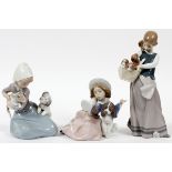 LLADRO PORCELAIN FIGURES, THREE, H 5 1/2"-10":  Girls with dogs and kitten, including "Who's the