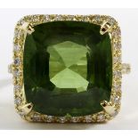 18.54CT NATURAL PERIDOT & DIAMOND RING, SIZE  7.5, GIA: An 18kt yellow gold lady's ring,