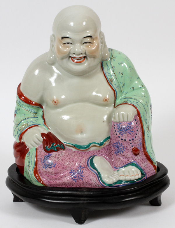 CHINESE PORCELAIN BUDDHA, TWO, H 9":  A seated  Buddha along with a fitted teak stand.
