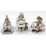 LLADRO PORCELAIN FIGURES THREE H 7":  Three  figures of girls with dog, kittens and cat on  scale.