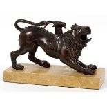 CHINESE BRONZE FIGURE OF A LION, H 6", L 9":   Mounted on a brown marble slab. From a pominent